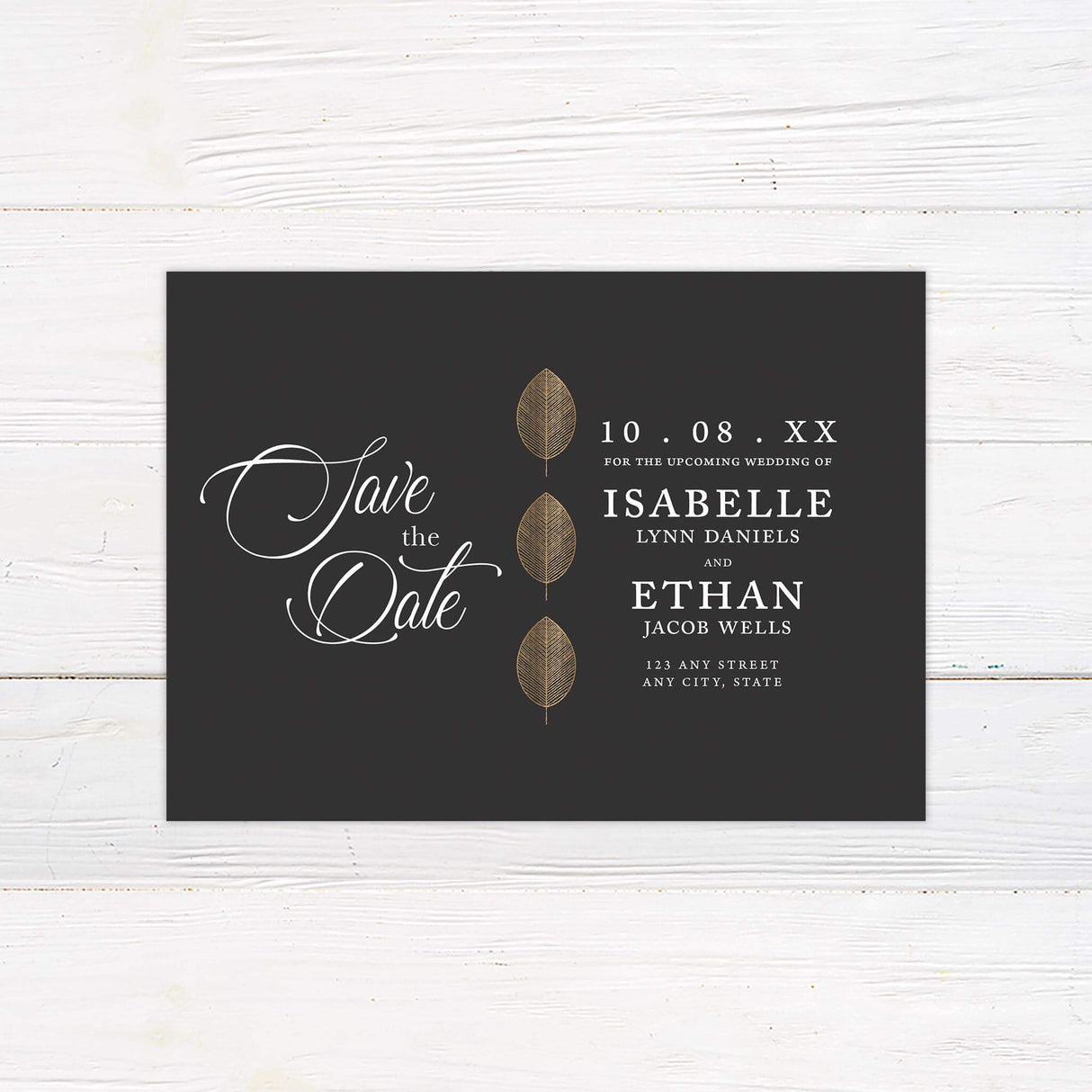 Matching save the date card with gold leaf motifs and a modern black and white design.