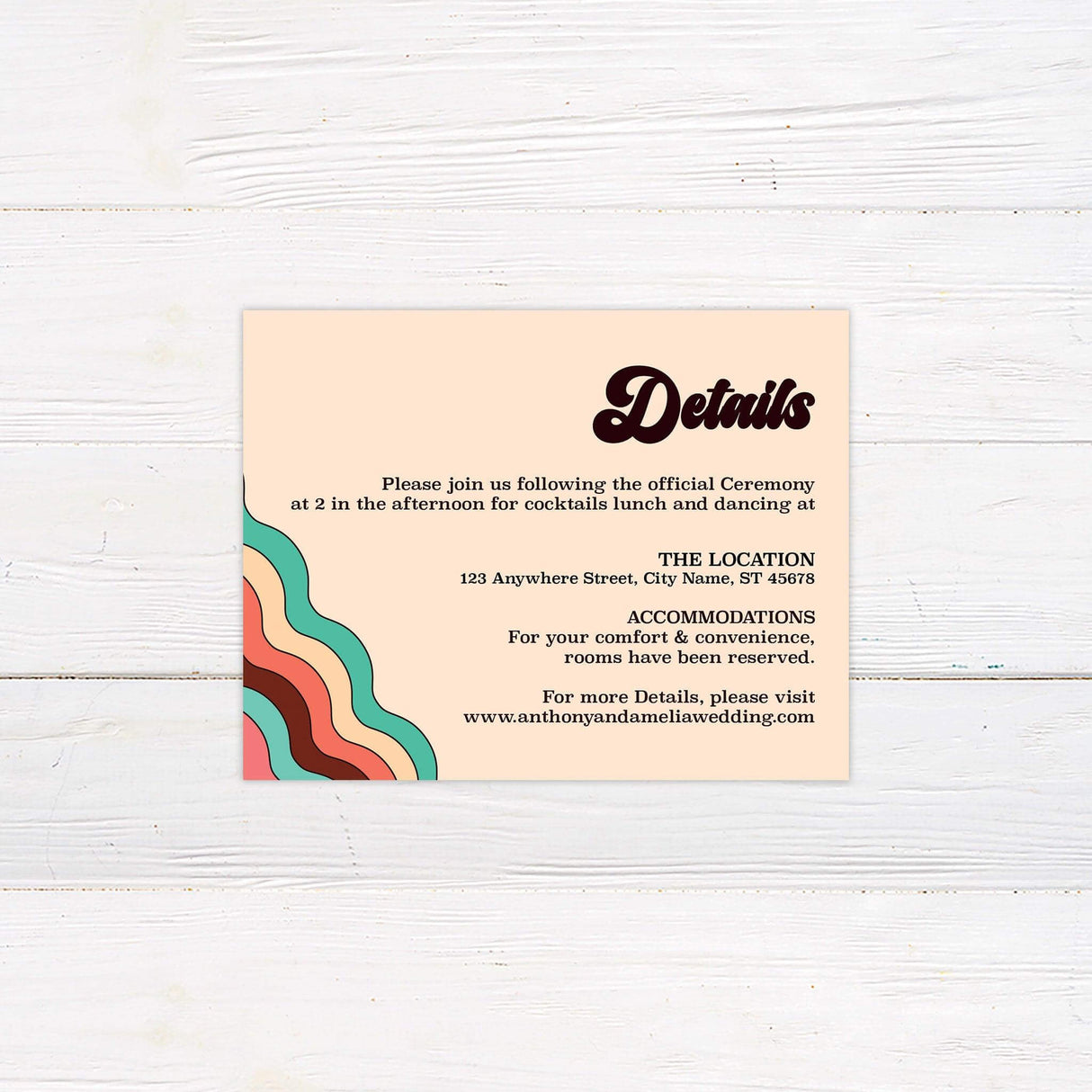 Colorful wedding detail card with rainbow wave accents and retro serif fonts for directions and info.