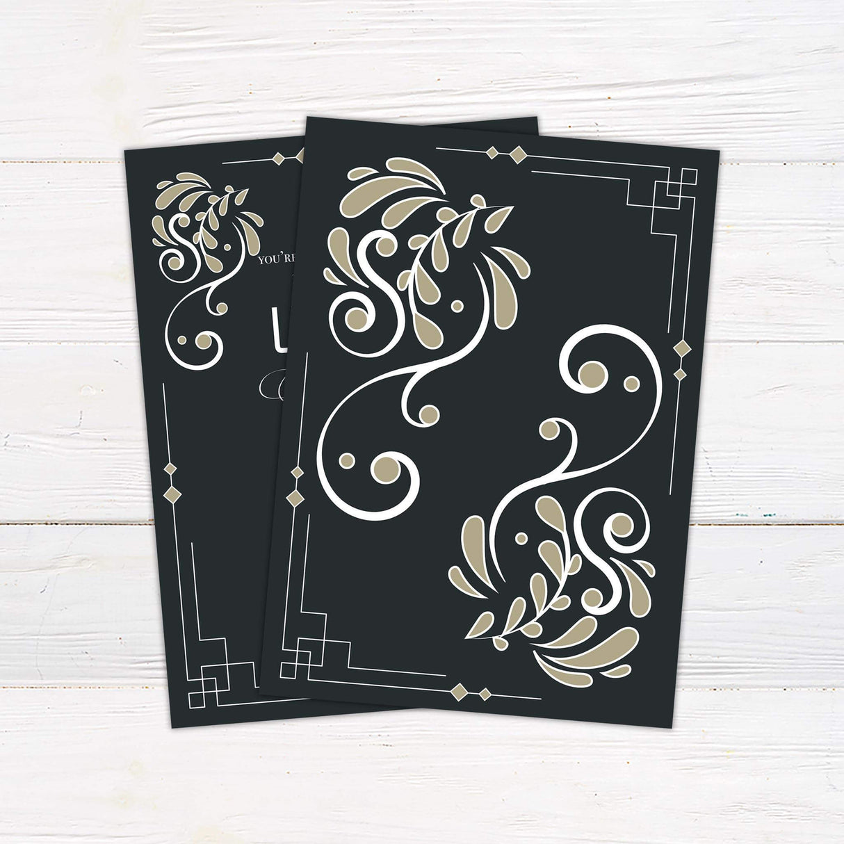 Black and gold art deco wedding invitation with vintage borders, geometric lines, and flourish accents in an elegant retro romance style.- back side