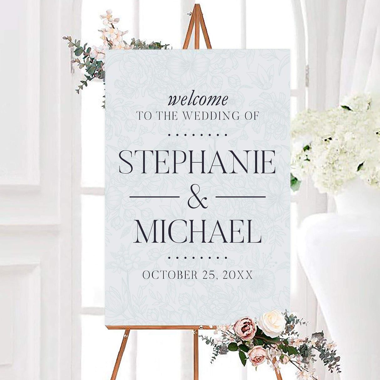 Light blue rococo blue wedding welcome sign with delicate floral line art and large personalized couple names in dark serif lettering. Elegant botanical details, an ampersand, dotted accents, and the wedding date complete the design.