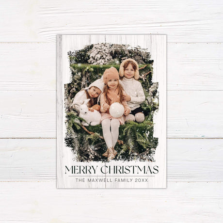 Rough Edge Christmas card with rustic wood background, distressed photo frame, personalized family picture, and Merry Christmas greeting.