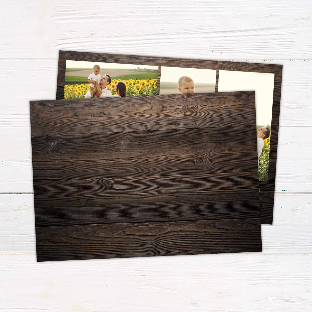 A rustic holiday card with a wooden background and multiple family photo collage design. The card features “Merry Christmas” in elegant script. - back.