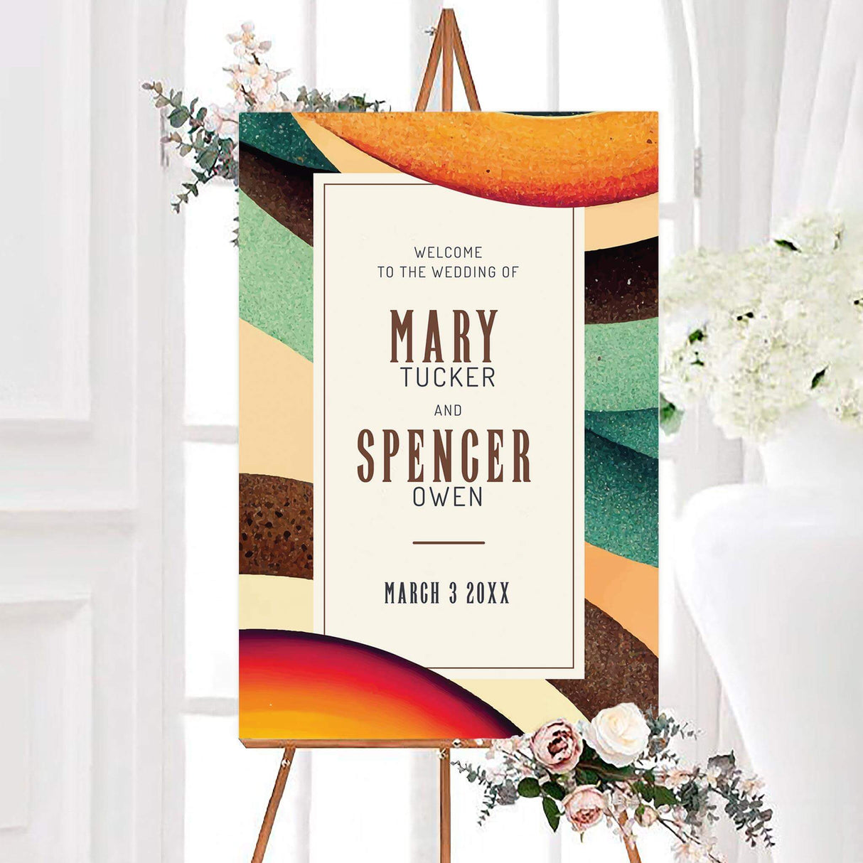 Retro rustic decade wedding welcome sign with textured organic shapes in green, brown, orange, yellow, and red. The cream center panel features personalized couple names and a wedding date in vintage typography.
