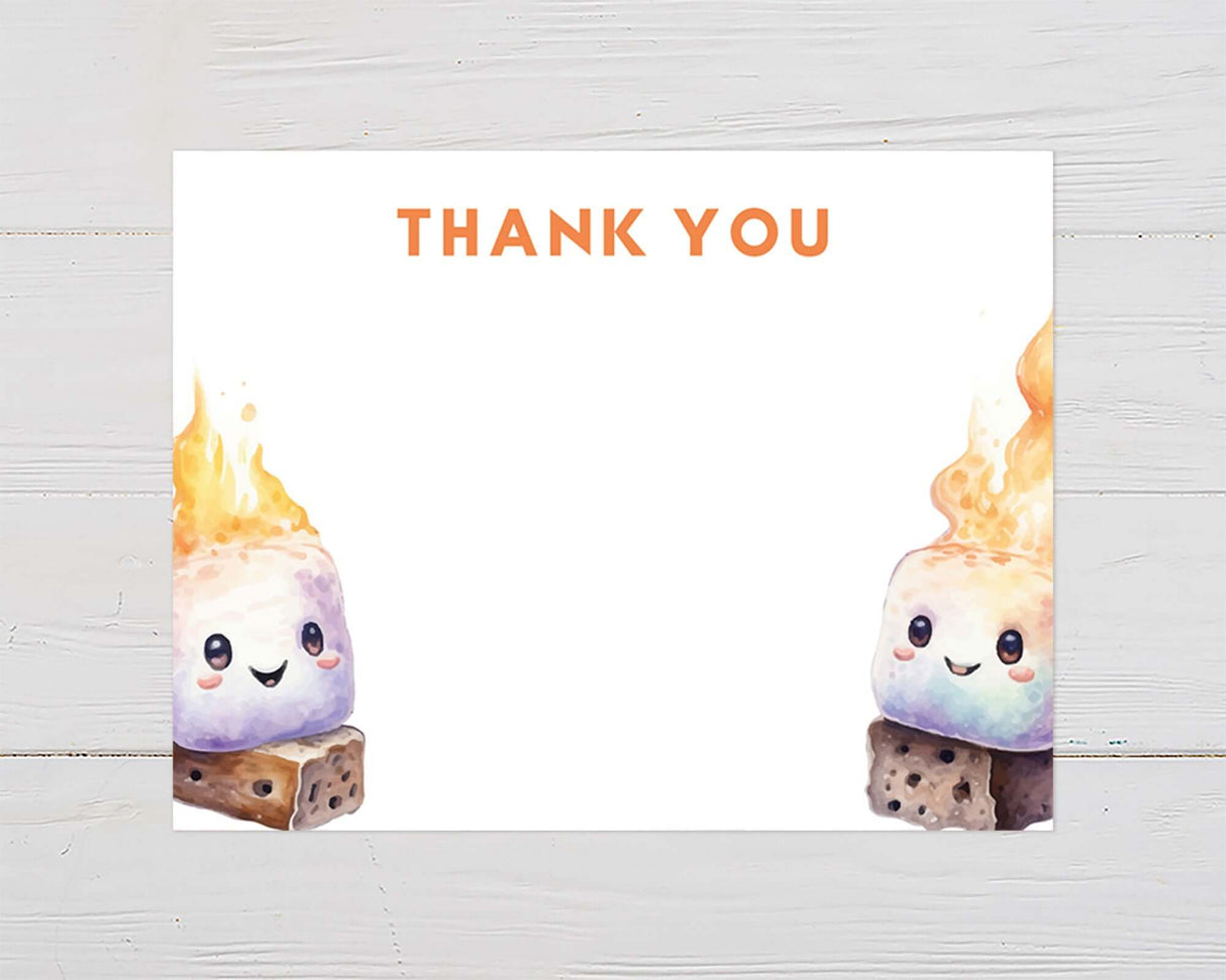 Cute thank you card with smiling marshmallow characters on graham crackers, perfect for camping or outdoor-themed baby showers.