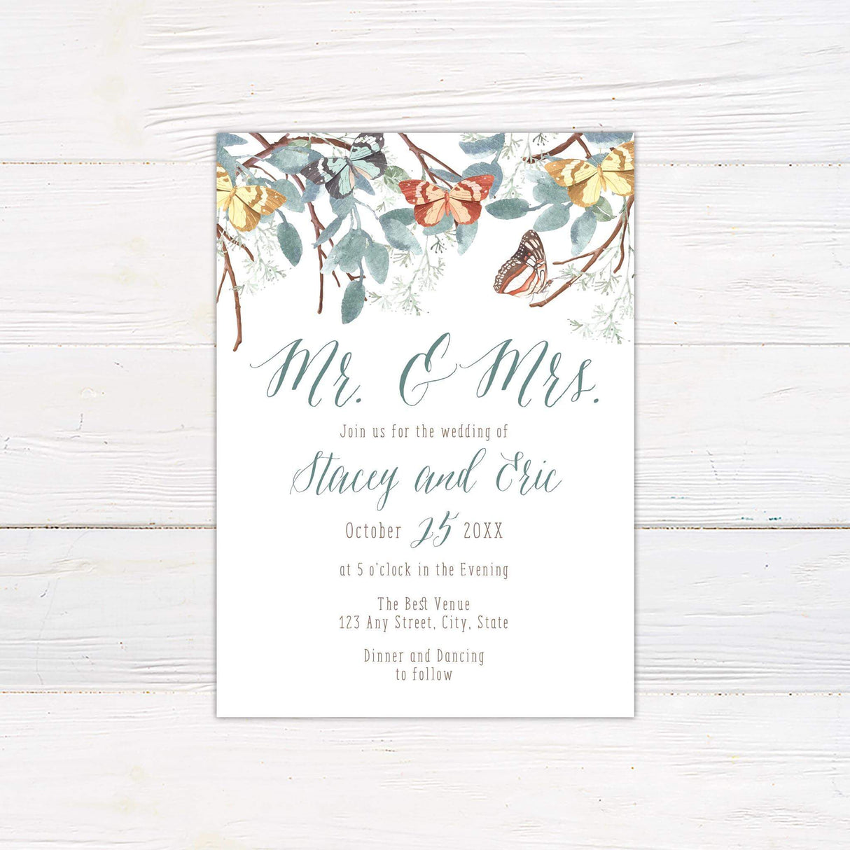 Sage green wedding invitation with watercolor eucalyptus leaves, autumn butterflies, and elegant script and serif fonts.
