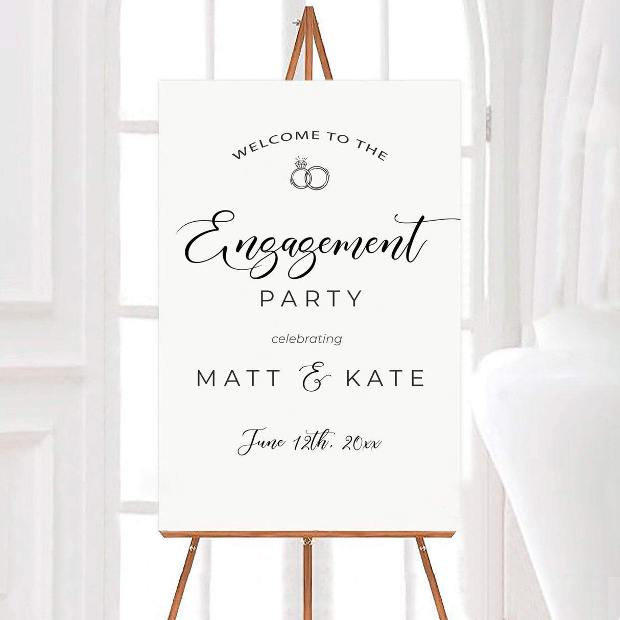 Modern script engagement invitation with elegant fonts and ring icon, perfect for romantic celebrations.