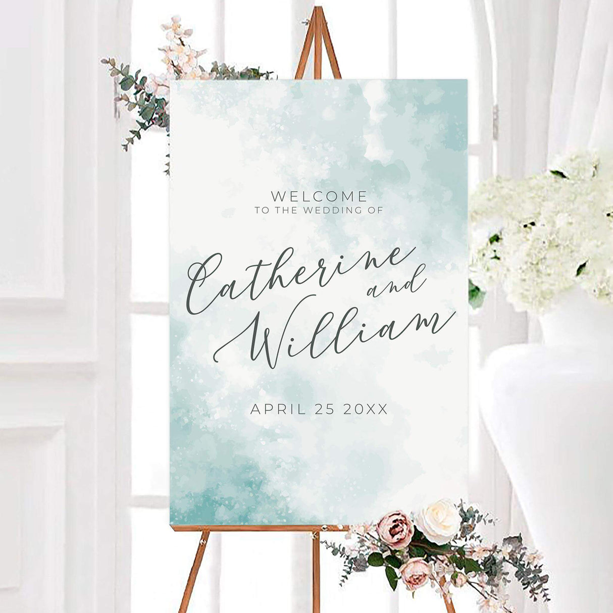 Seafoam brushstroke wedding welcome sign featuring elegant dark gray calligraphy with the couple’s names and wedding date. Soft aqua, mint, and white brushstrokes create an airy modern background.