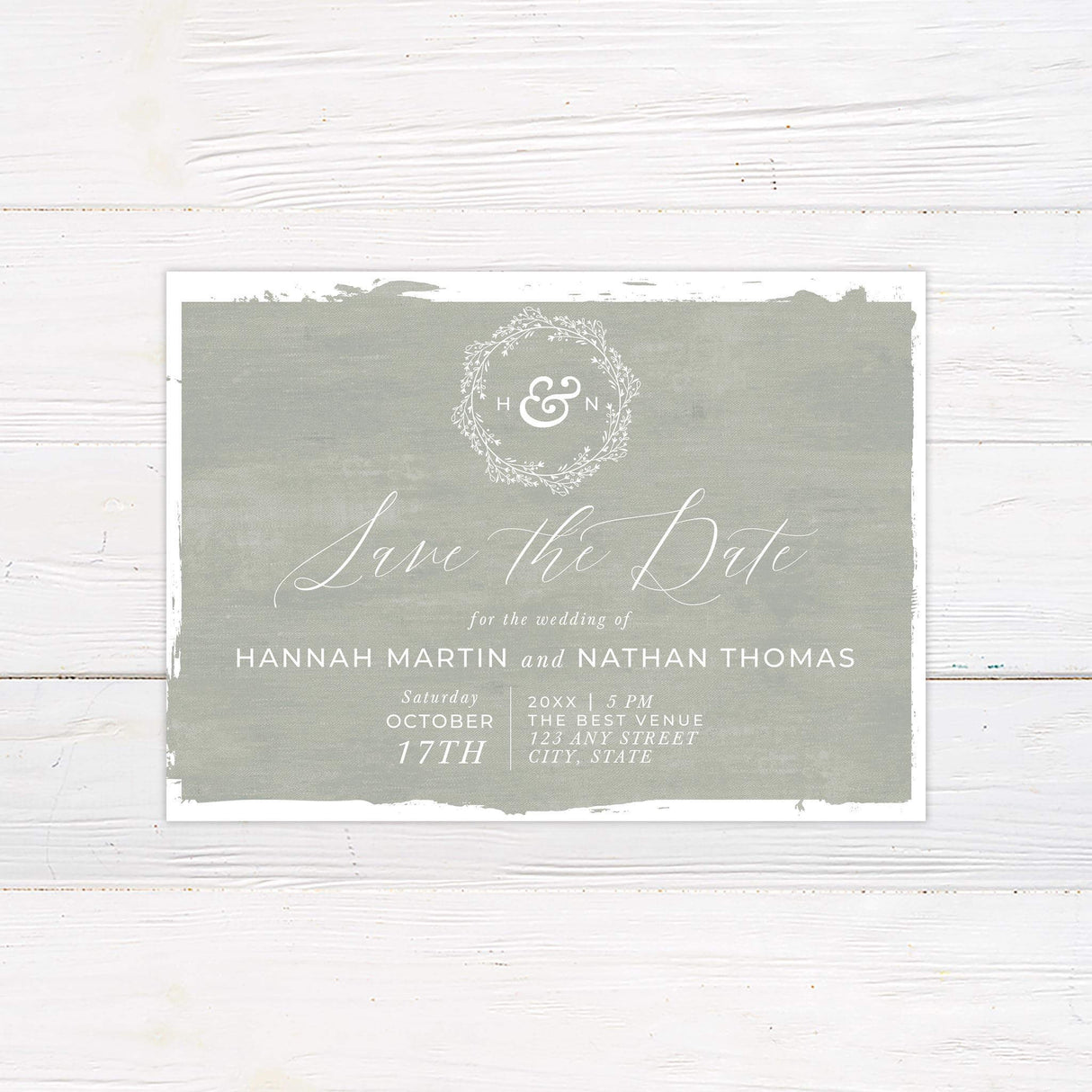 Save the Date card with sage painted design and elegant handwritten and serif fonts.