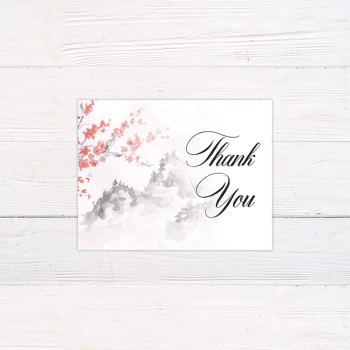 Matching thank you card with soft watercolor floral design and minimalist text.