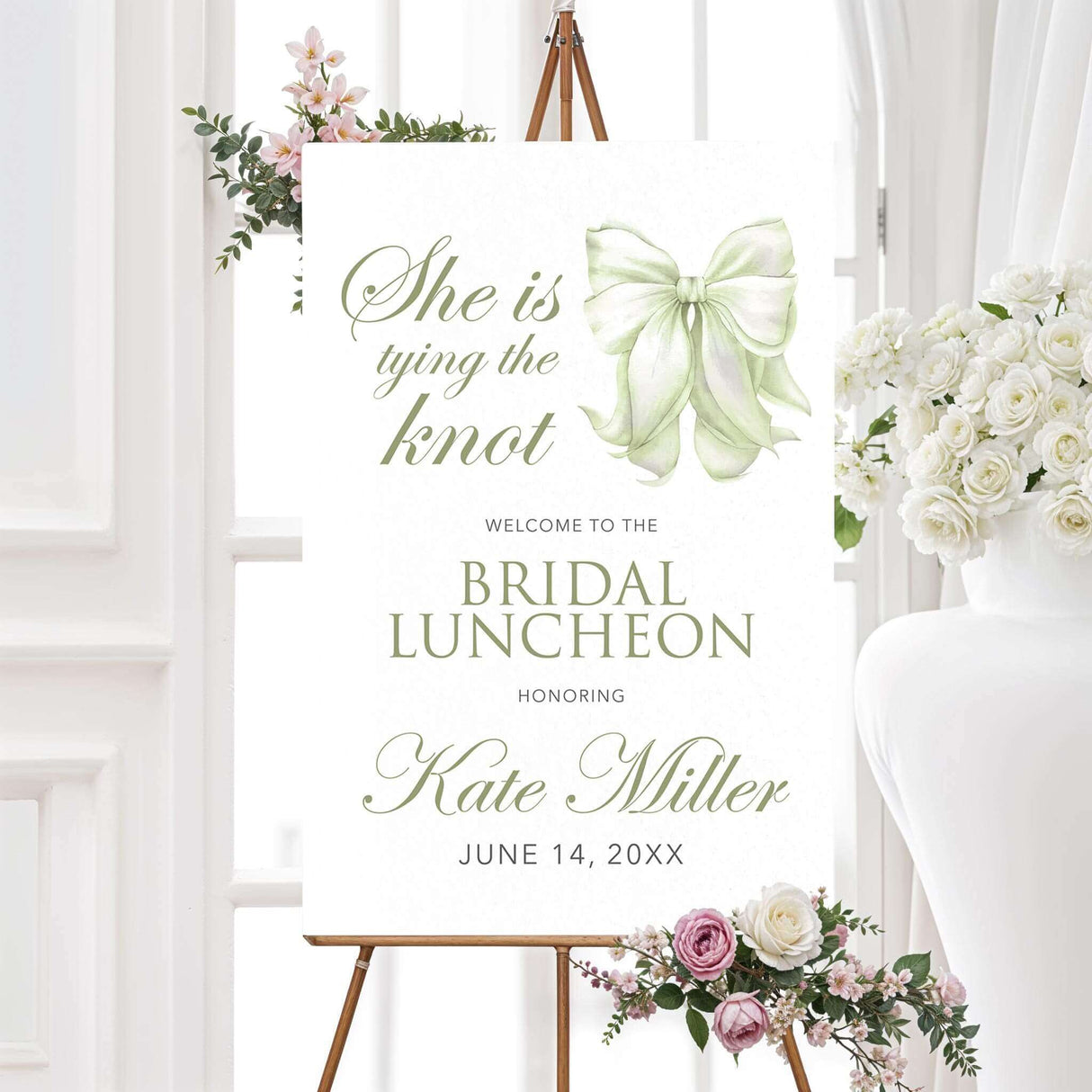 Bridal luncheon invitation welcome sign with sage green watercolor bow and elegant script on textured white background for a tying the knot themed shower