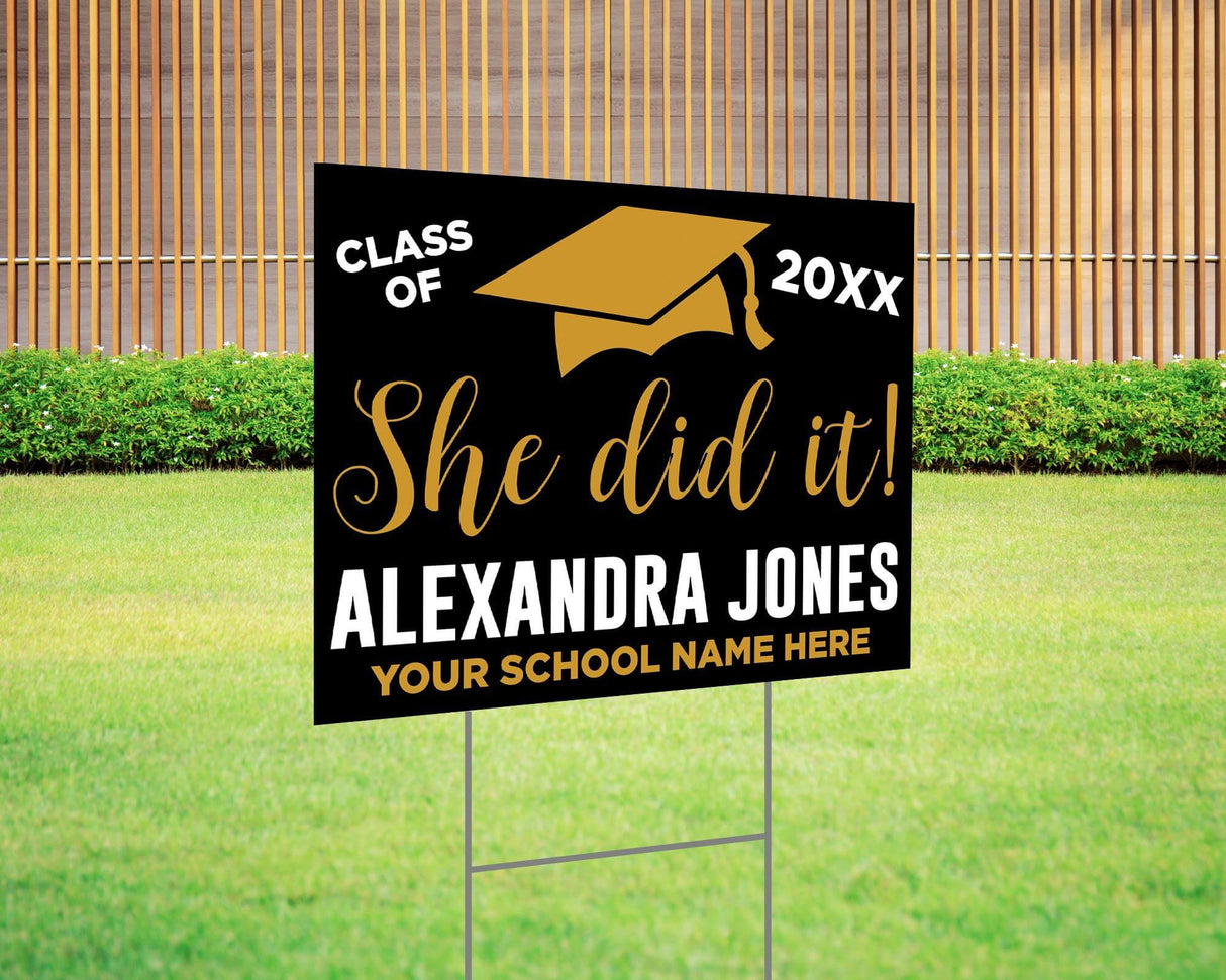 She Did It! graduation yard sign featuring a bold mortarboard cap, custom class year, and school name. Printed on durable Coreplast plastic, available in custom colors and single or double-sided print, perfect for high school and college graduates. Gold and Black
