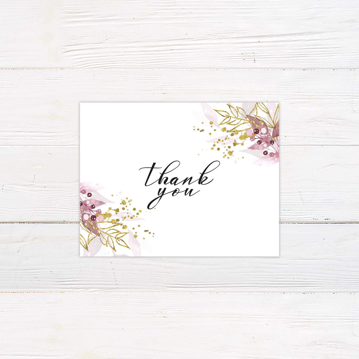 Thank you card with coordinating burgundy watercolor leaves and gold accent dots on a clean layout.