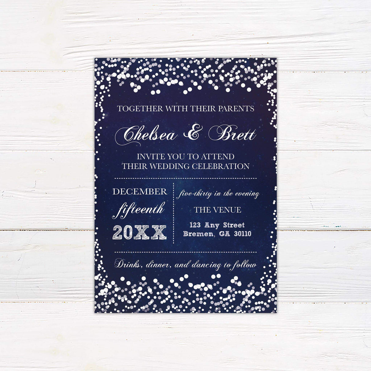 Navy and silver glitter wedding invitation with confetti border, elegant script and serif fonts, printed on white cardstock for winter wedding