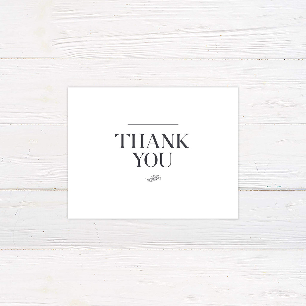 Minimalist thank you card with matching monogram and classic typography for elegant weddings