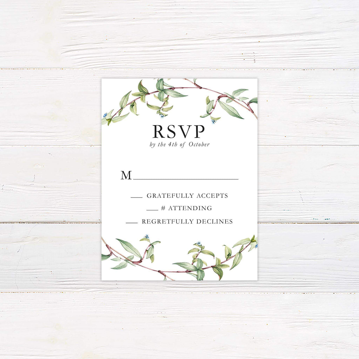 Minimalist RSVP card with green botanical accents and serif fonts