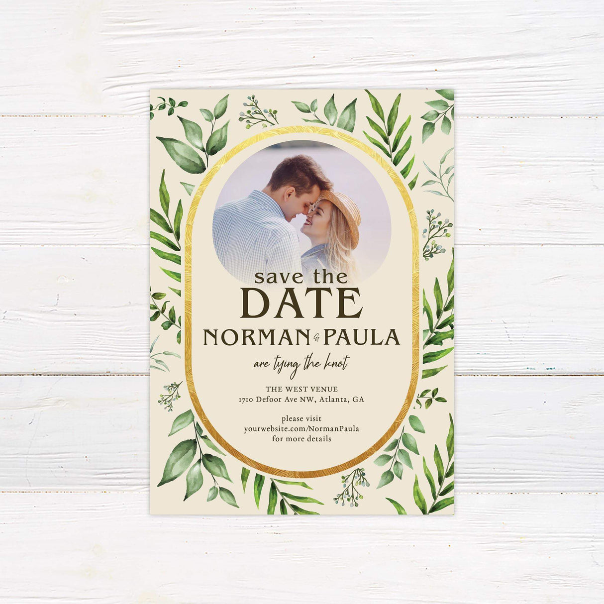 Save the Date card with eucalyptus art and soft neutral background