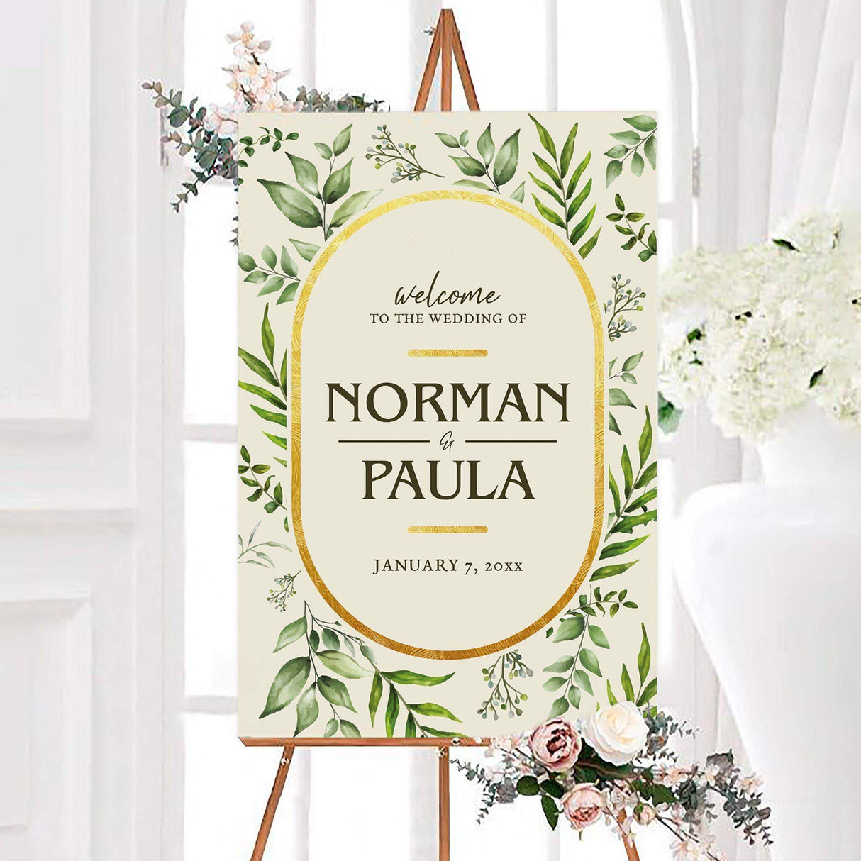 Welcome sign with eucalyptus border and gold oval frame
