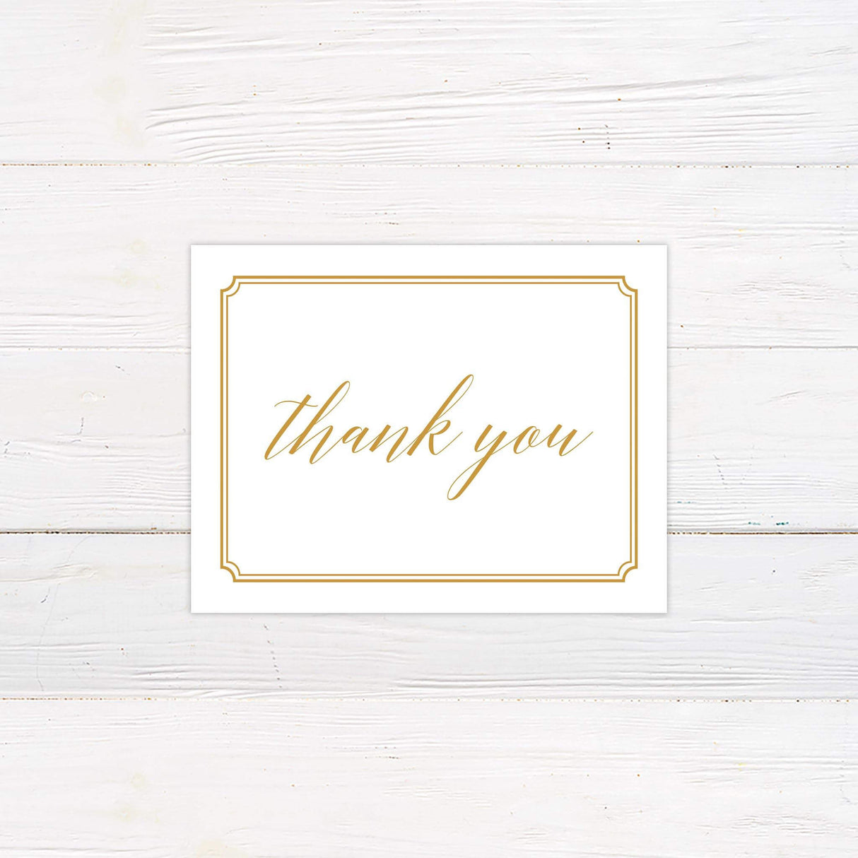 Thank you card with gold serif fonts and clean border