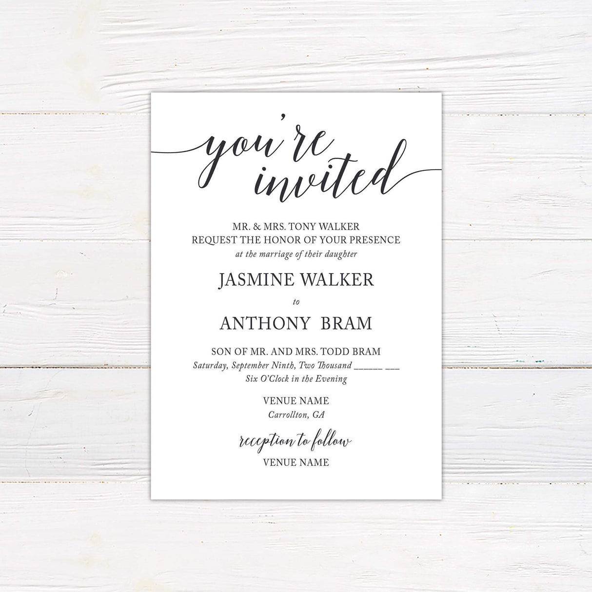 Elegant wedding invitation with "You're Invited" script in calligraphy and classic serif fonts on a white background.