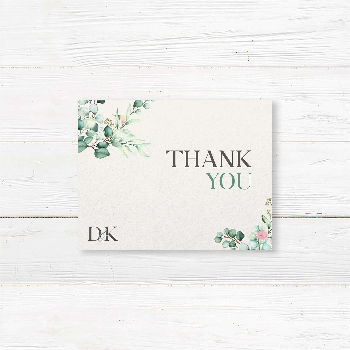 Wedding thank you card with eucalyptus wreath and minimal text, printed on soft ivory textured paper