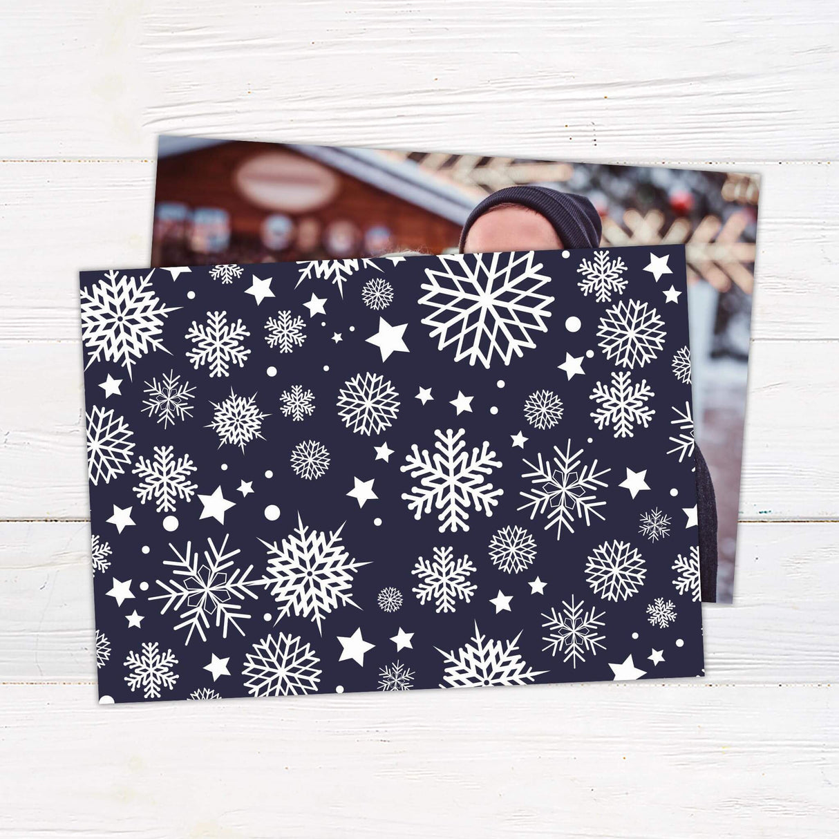 A simple holiday card design with a large family photo. The text says “Merry Holidays” with a personalized family name below. - back.