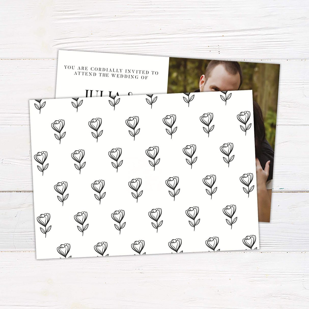 Wedding invitation with black serif and script fonts, engagement photo, and elegant monochrome layout- back side