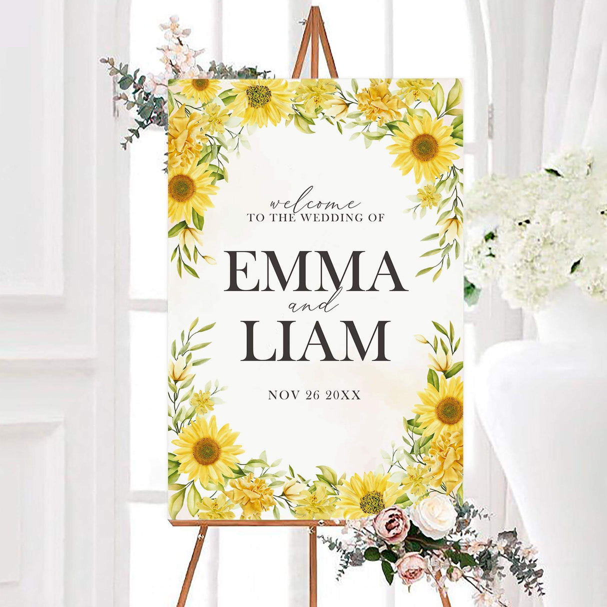 Personalized simple sunflower wedding welcome sign framed with watercolor yellow sunflowers, golden flowers, and green foliage. The white-centered design features the couple’s names and wedding date in elegant black serif and script typography.