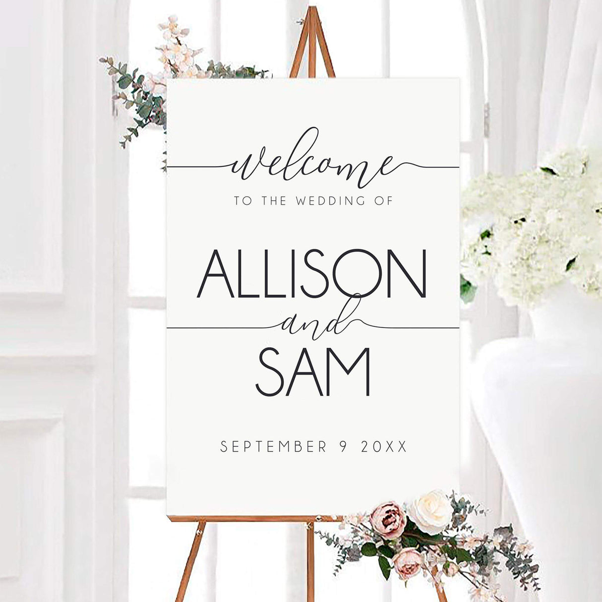 Minimalist black and white simple we do wedding welcome sign featuring large modern typography and elegant handwritten script. The personalized design displays the couple’s names and wedding date on a clean white background.