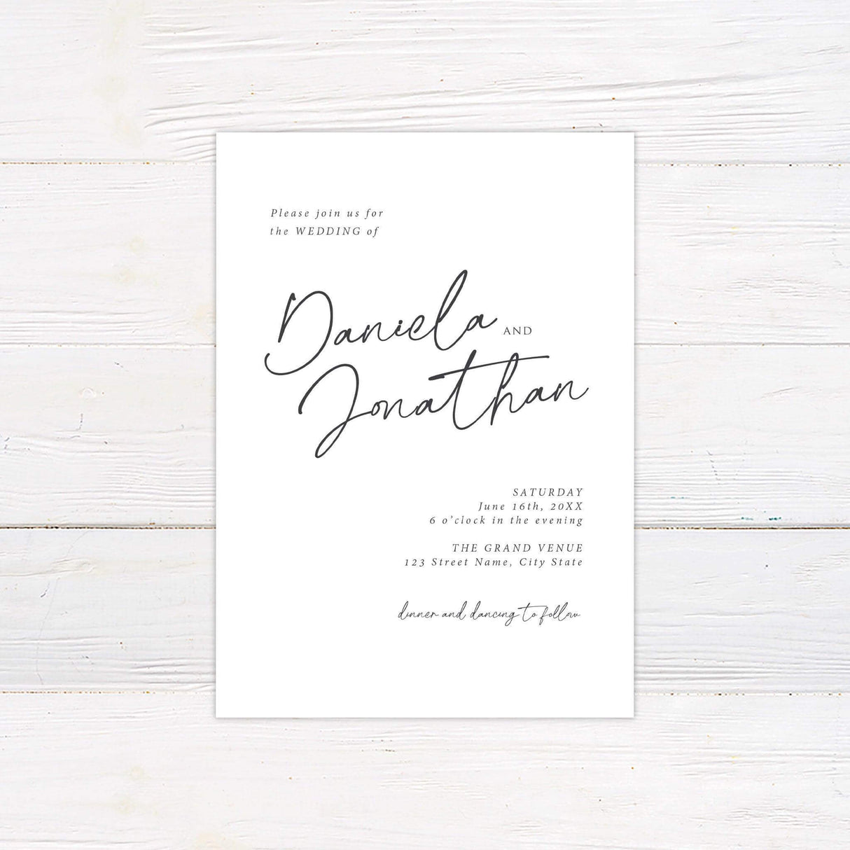 Minimalist wedding invitation with elegant script font and classic black and white design.