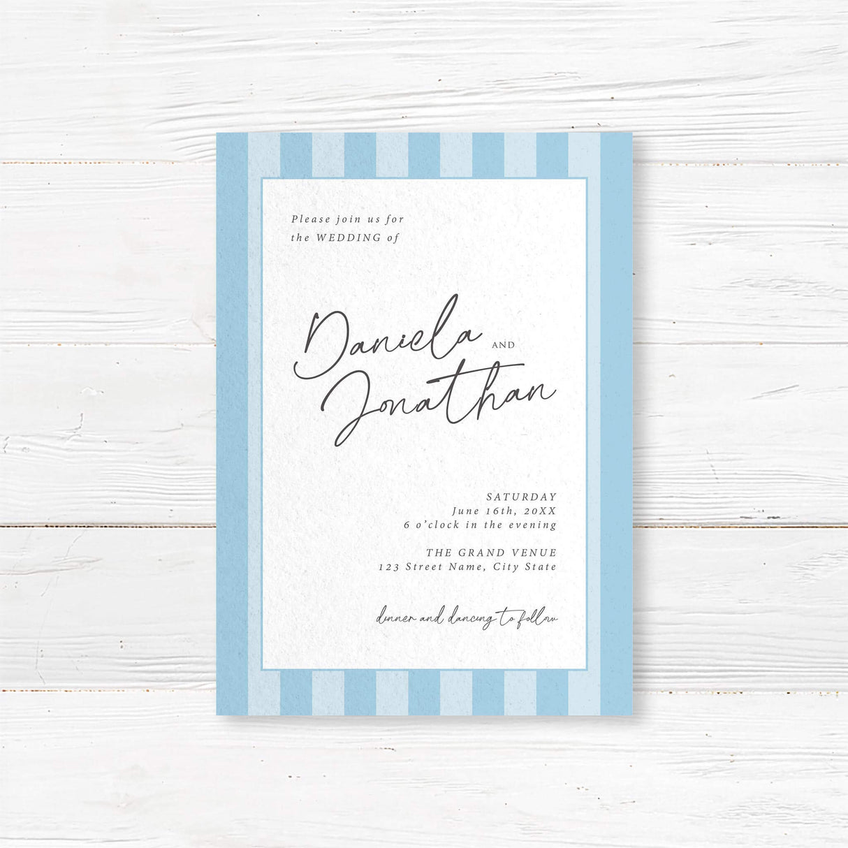 Minimalist wedding invitation with alternating soft blue and white vertical stripes, a white center panel, and elegant handwritten script and serif font layout for a clean modern wedding style.