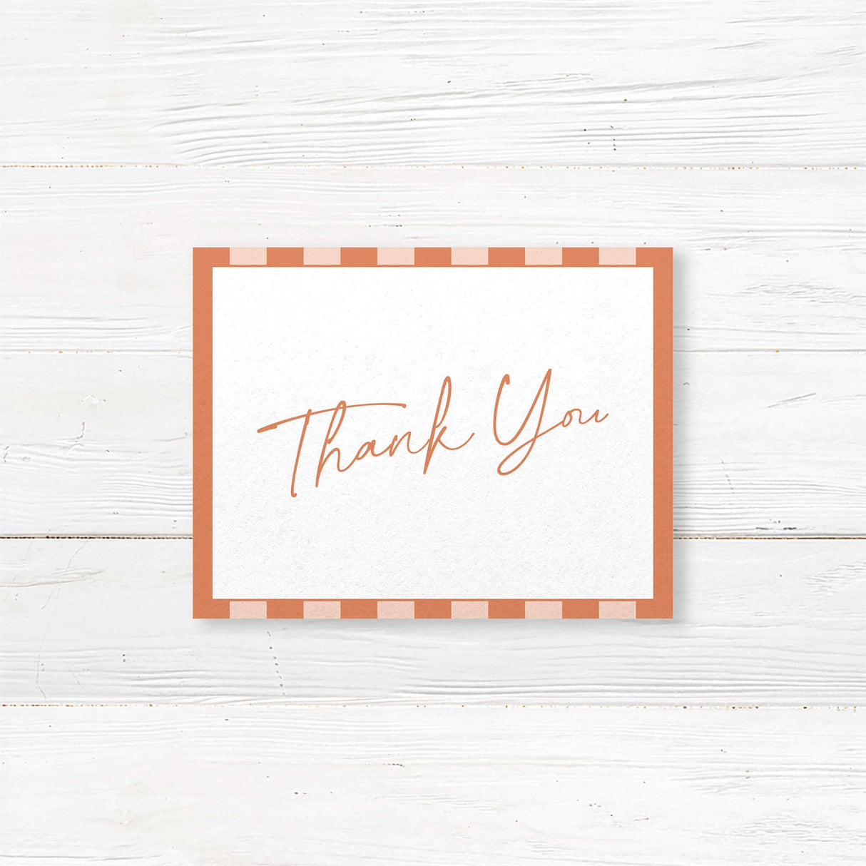 Wedding thank you card with vertical terracotta and neutral stripes, white center panel, handwritten script and serif fonts, matching Simply Written wedding stationery.