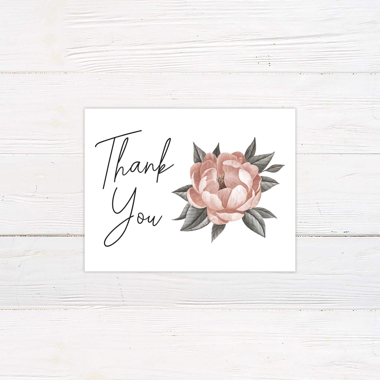 Matching thank you card with soft blush floral motif and handwritten script from the Single Bloom wedding suite.