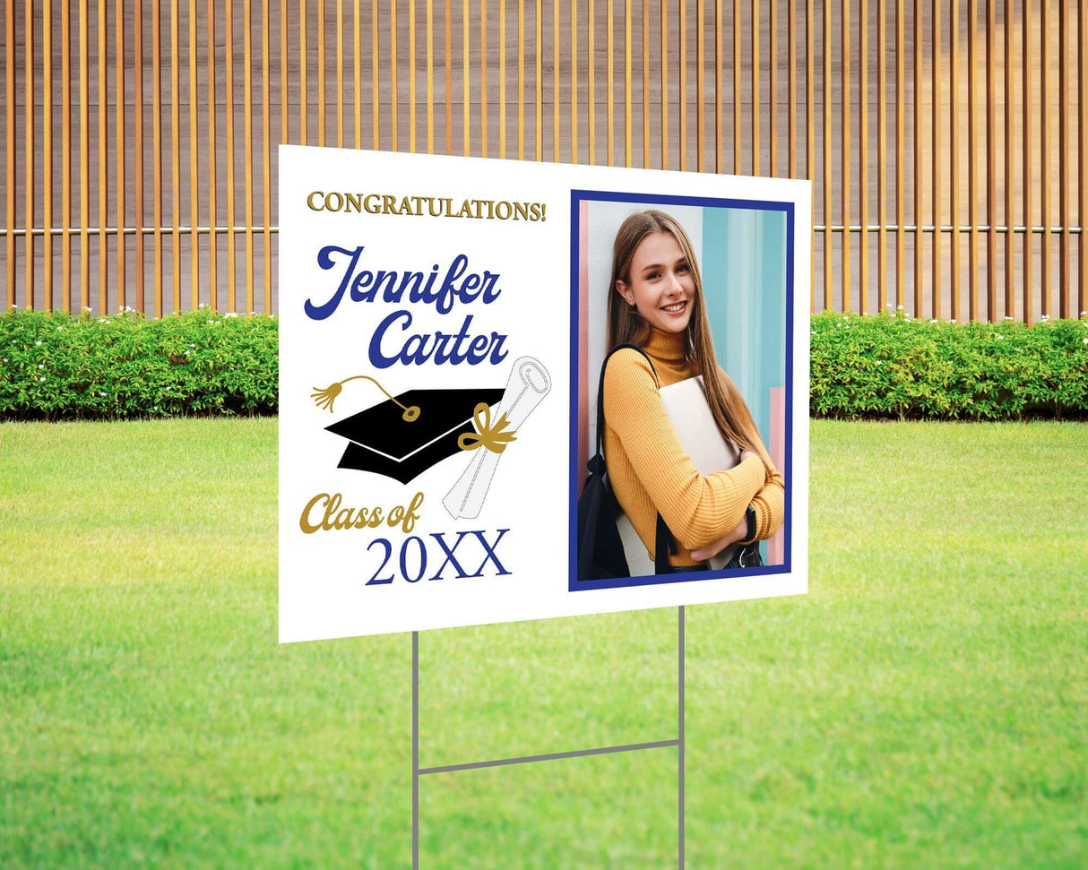 Congratulations graduation yard sign featuring a split design with a side photo, bold script name, mortarboard cap, and diploma graphic, along with the class year and school name in gold accents. Printed on durable Coreplast plastic, available in custom colors and single or double-sided print, perfect for high school and college graduates. Blue and Gold