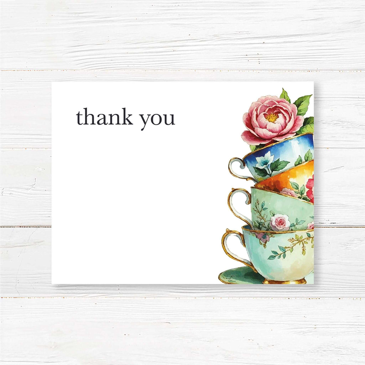 Thank you card with floral teacups and watercolor rose design on white background