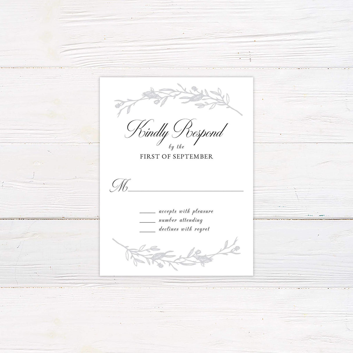 RSVP card with sketched vine border and classic serif text to match the Sketched Vine wedding suite.