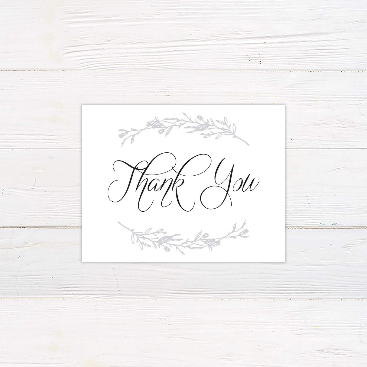 Matching thank you card with delicate botanical sketch and elegant script from the Sketched Vine wedding collection.