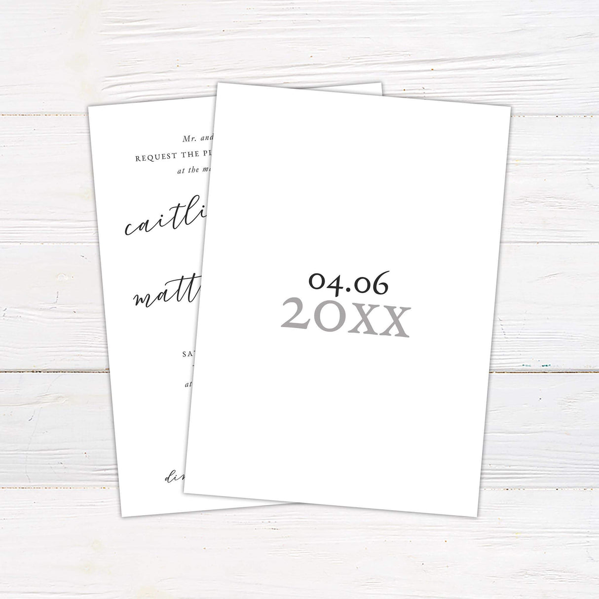 Modern wedding invitation with slanted handwritten script for names and clean serif font for event details on a minimalist white background.- back side