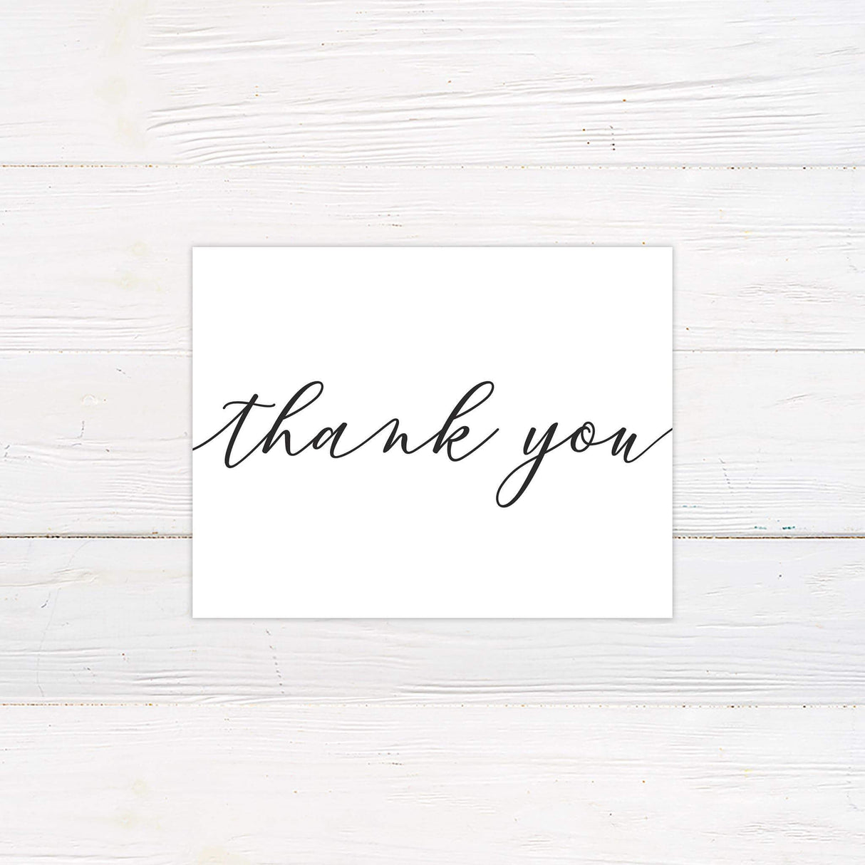 Thank you card featuring slanted script and elegant minimalist typography from the Slanted Script wedding collection.
