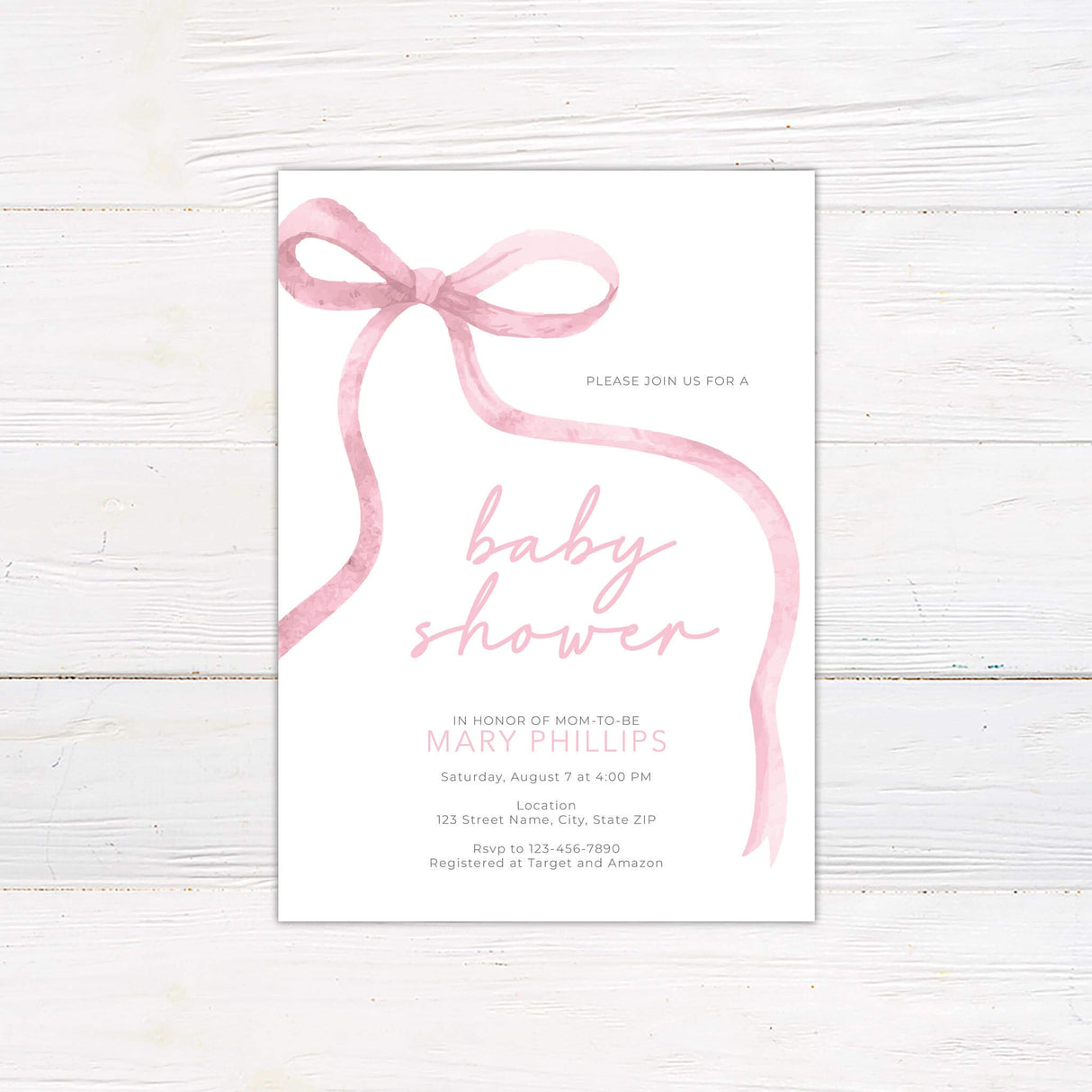 Elegant baby shower invitation with a soft pink watercolor ribbon design on a white background. Features delicate script and modern typography, perfect for celebrating the mom-to-be. Includes event details such as date, time, and location. A sophisticated and stylish choice for a baby girl shower.
