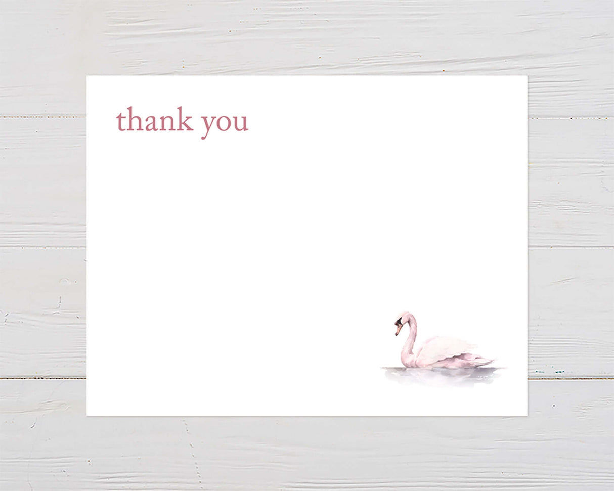 Elegant thank you card with soft pink watercolor swan design on white background, perfect for baby showers and celebrations.