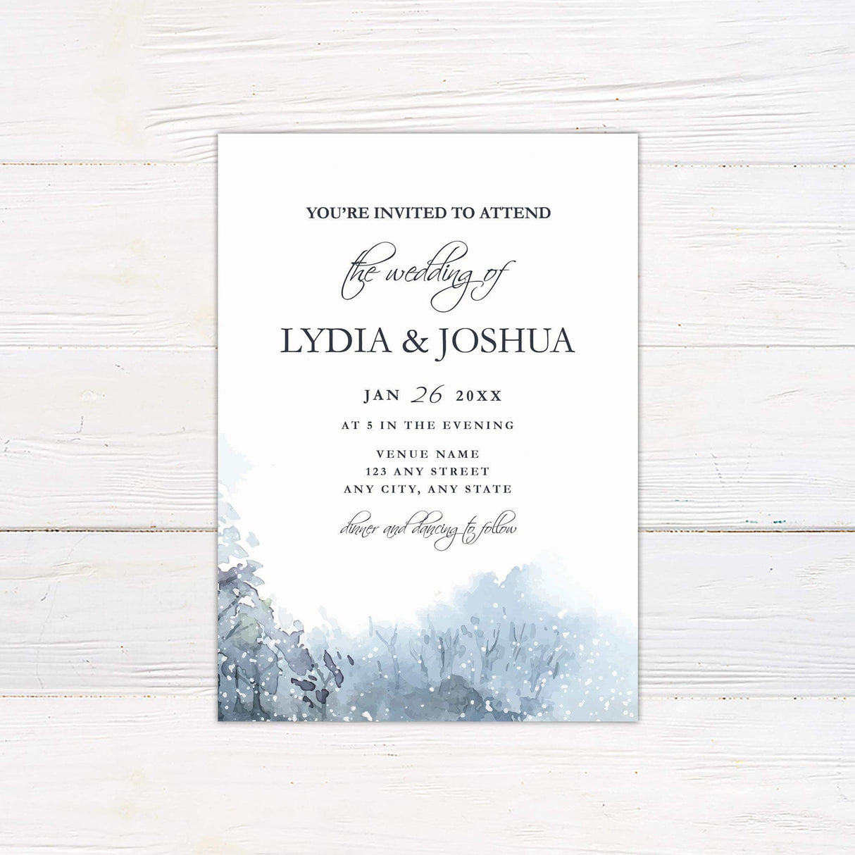 Winter wedding invitation with watercolor snowy landscape and elegant serif and script fonts on a soft white background.