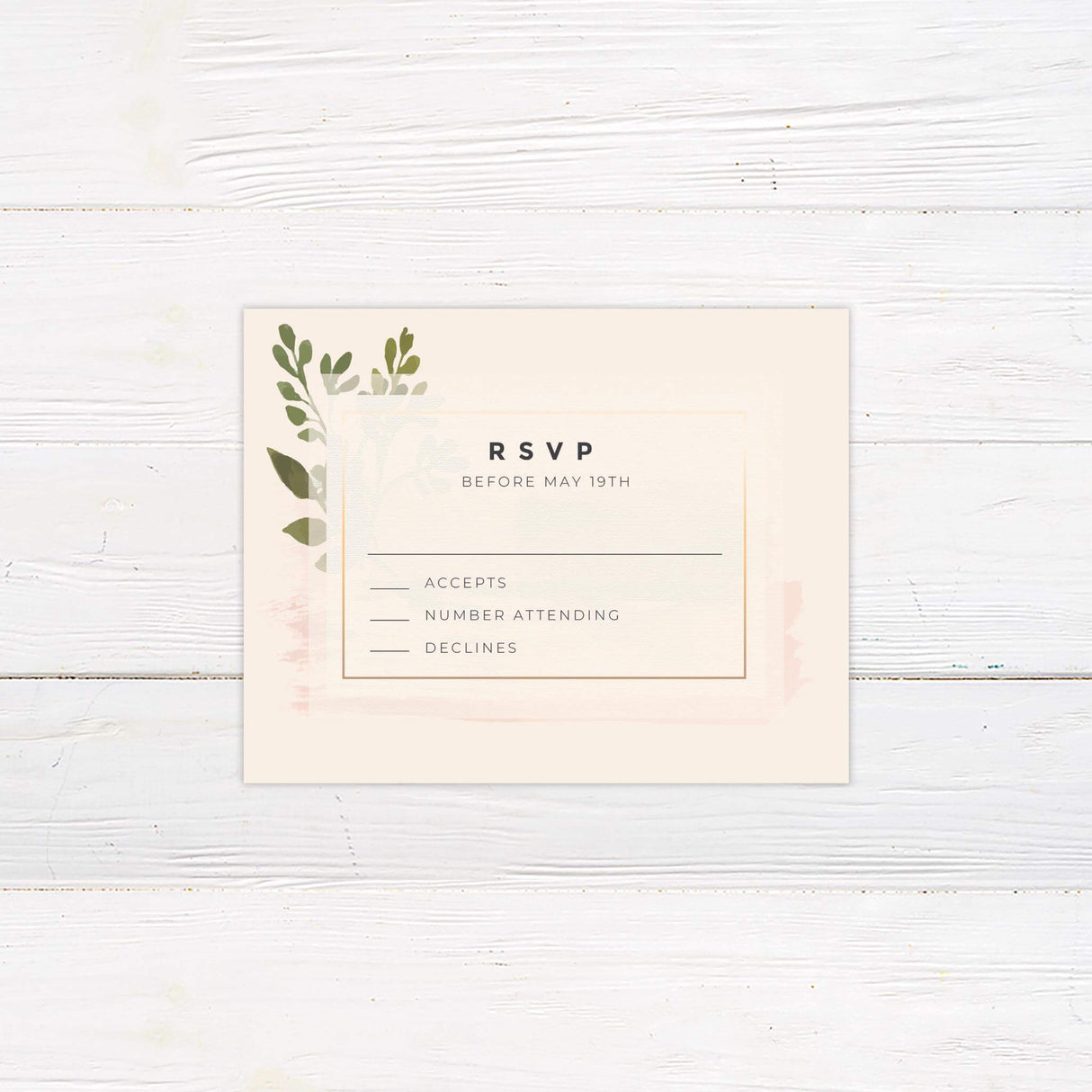 RSVP card with watercolor greenery and floral elements matching the Soft Touch wedding suite.