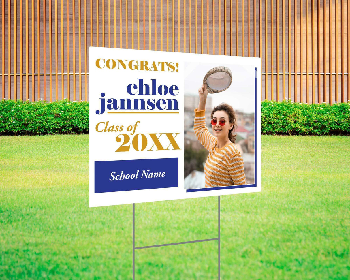 Fun and bold graduation yard sign with a split design featuring a photo on one side and playful, high-contrast text on the other. Includes "Congrats!" message, custom class year, and school name. Printed on durable Coreplast plastic, perfect for outdoor celebrations, driveways, and front yards. blue and gold