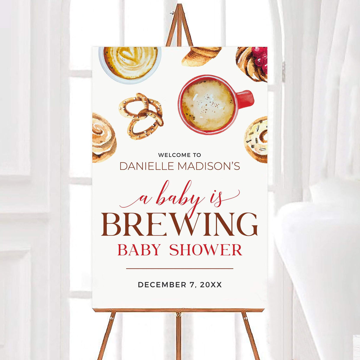 Baby shower welcome sign featuring a cozy coffee theme with watercolor illustrations of lattes, pastries, and pretzels. The phrase "A Baby is Brewing" is displayed in elegant script and serif fonts, creating a warm and inviting design. Set against a light background, this sign is perfect for a café-inspired or brunch-style baby shower. Ideal for display at the entrance to greet guests and add a stylish touch to the celebration.