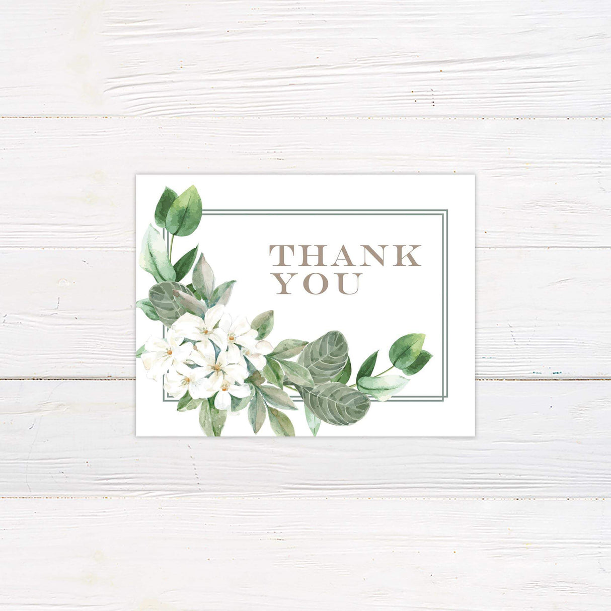 Thank you card with watercolor white flowers and green leaves to match the Southern Belle suite.