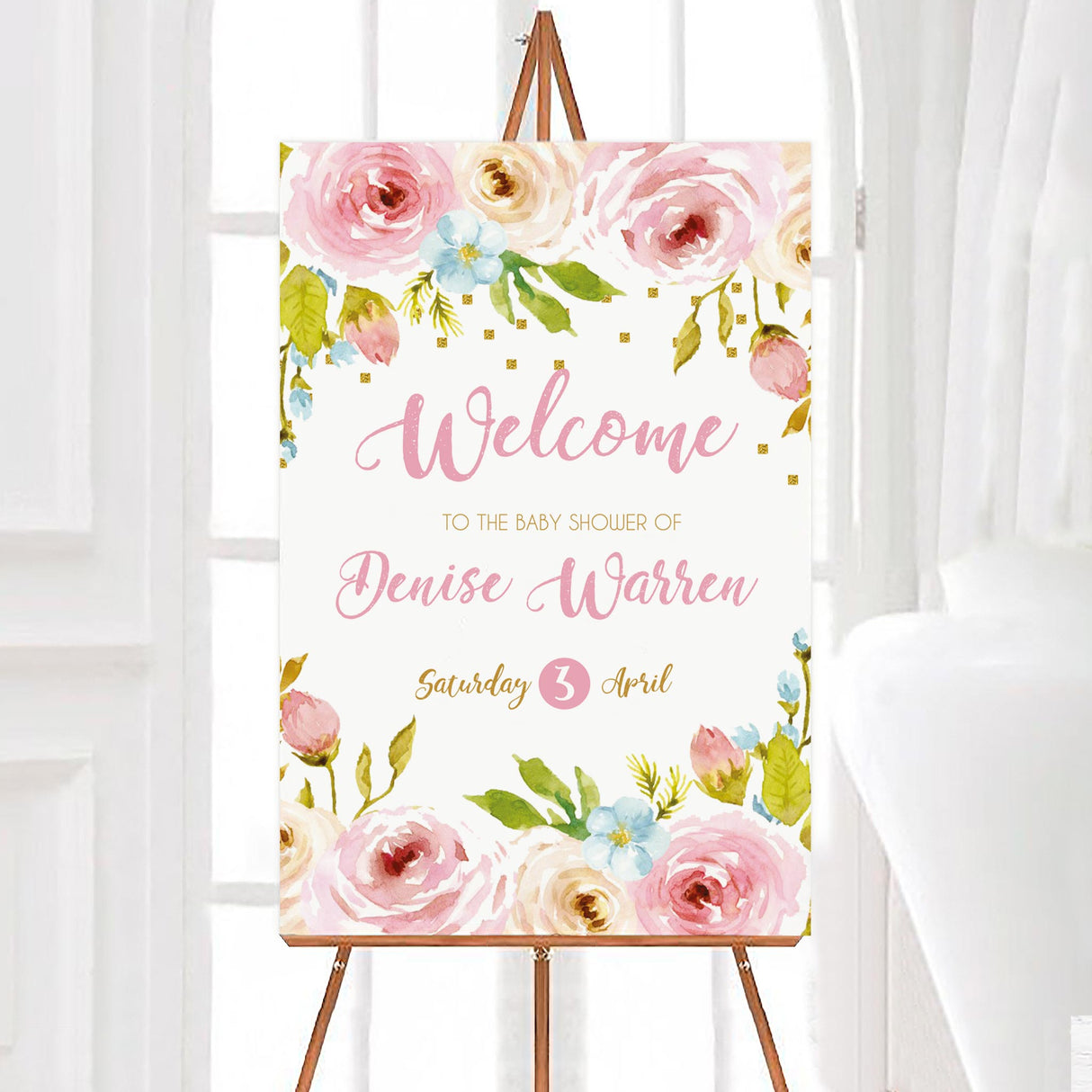 A floral spring blossoms baby shower welcome sign with pink flowers and greenery. The design includes soft watercolor details.