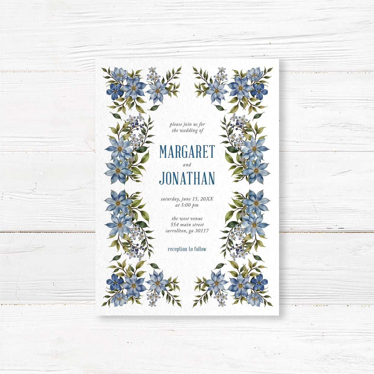 Elegant blue floral wedding invitation featuring navy and dusty blue watercolor flowers with greenery. Printed on luxury textured cardstock, perfect for garden, classic, and romantic weddings. Customizable with names, wedding date, and venue details.