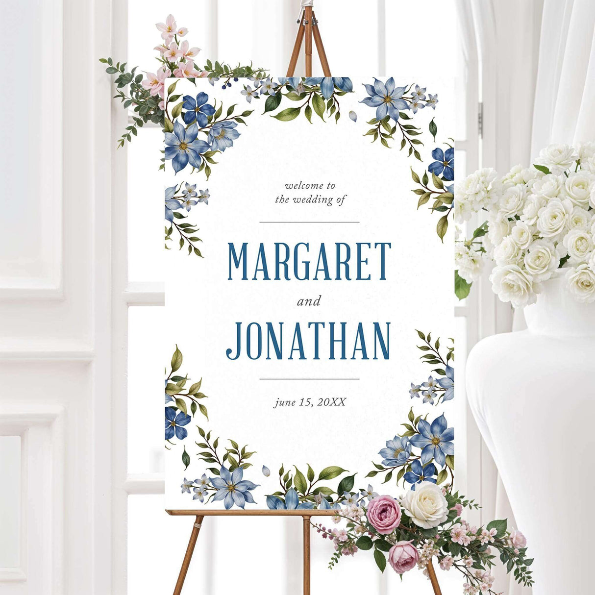 Stunning floral wedding welcome sign with elegant blue and green watercolor flowers. Printed on durable foam core or poster board, perfect for a classic wedding entrance display.