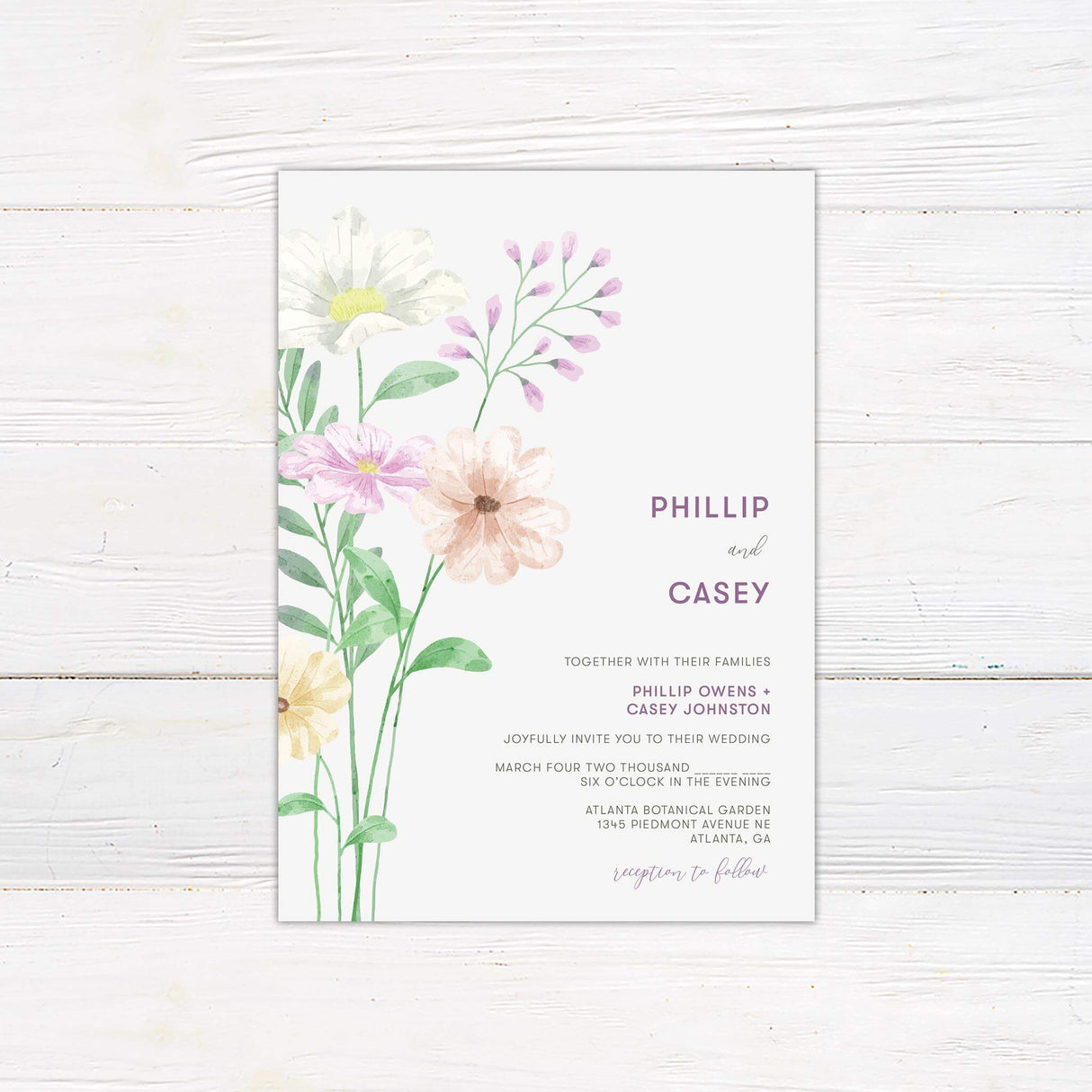 Wedding invitation with pastel watercolor flowers and elegant script and serif fonts, ideal for a spring or garden wedding.