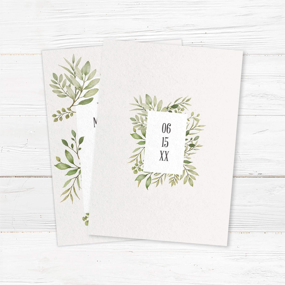 Elegant greenery wedding invitation with watercolor foliage on textured ivory cardstock. Customizable with names, wedding date, and venue details. Ideal for rustic outdoor weddings, minimalist botanical themes, and modern garden ceremonies. Printed on high-quality cardstock with matching envelopes for a timeless wedding stationery suite. back